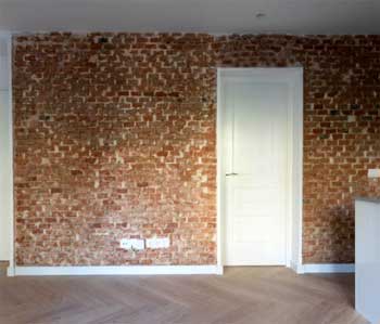 Imitación a piedra en casa antigua